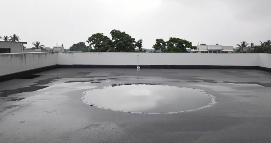 The Real Cost Of Letting Water Sit On A Flat Roof